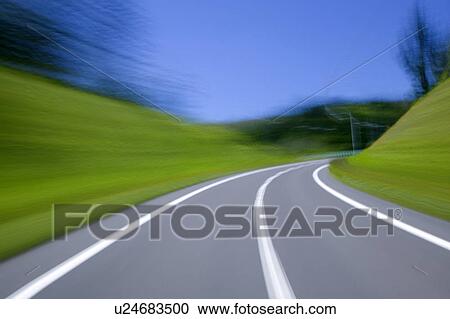 Stock Image - Curved road, Hokkaido Prefecture, Japan. Fotosearch
