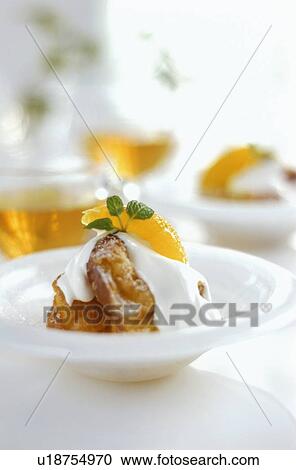 Dessert with yoghurt and orange slice View Large Photo Image Stock Image - Dessert with yoghurt and orange slice. Fotosearch