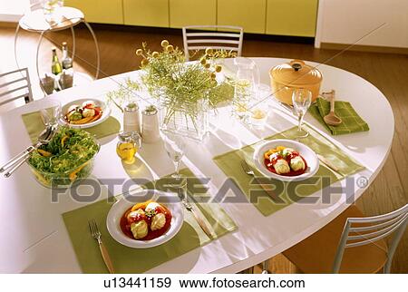 Dining table set for dinner View Large Photo Image Stock Photo - Dining table set for dinner. Fotosearch
