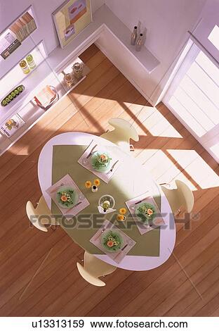 Stock Photo - Dining table set for four. Fotosearch