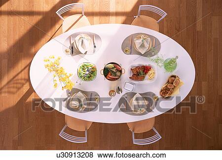 Stock Photo - Dining table set for four. Fotosearch