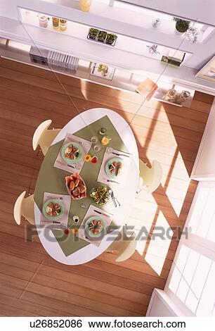Stock Photograph - Dining table with four meals. Fotosearch