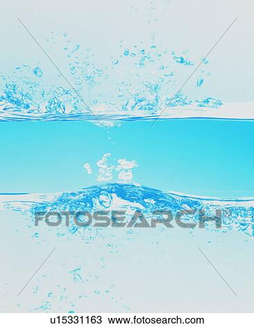 Stock Image - Drops on water surface. Fotosearch