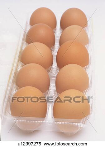 Eggs in carton, white background View Large Photo Image Stock Photography - Eggs in carton, white background. Fotosearch