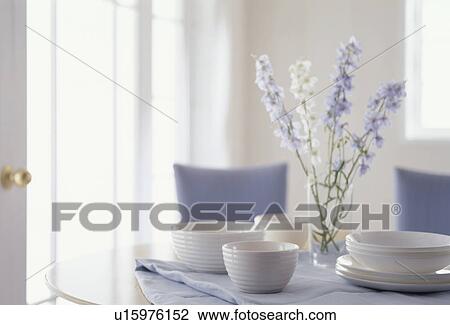 Elegant tableware in a modern setting View Large Photo Image Stock Image - Elegant tableware in a modern setting. Fotosearch