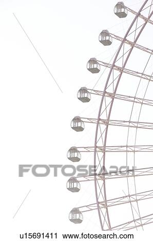 Ferris wheel on overcast day. Minato Mirai, Yokohama, Japan View Large Photo Image Stock Image - Ferris wheel on overcast day. Minato Mirai, Yokohama, Japan. Fotosearch