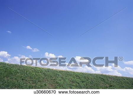 Field below blue sky and clouds, Chino, Nagano Prefecture, Japan View Large Photo Image Stock Image - Field below blue sky and clouds, Chino, Nagano Prefecture, Japan. Fotosearch