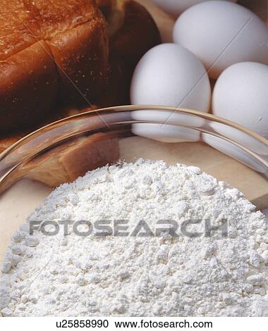 Stock Image - Flour in bowl. Fotosearch