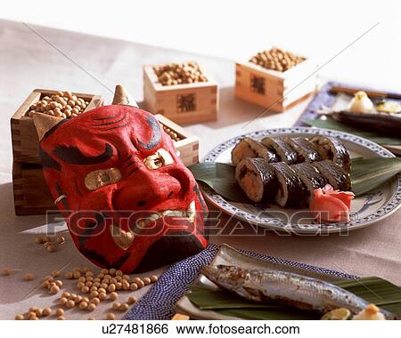 Stock Photograph - Food and mask for Japanese Setsuban festival. Fotosearch