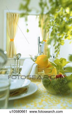 Stock Image - Food arranged on dining table. Fotosearch