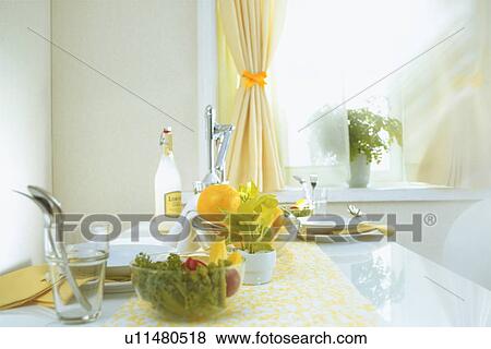 Stock Photo - Food arranged on dining table. Fotosearch