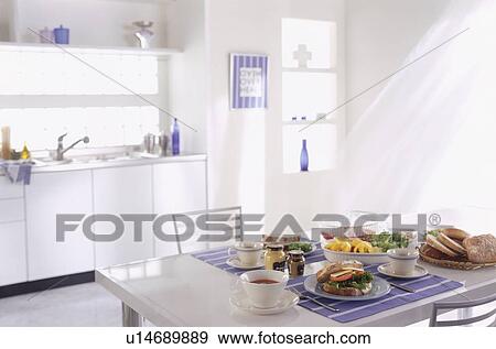 Food arranged on dining table View Large Photo Image Stock Photo - Food arranged on dining table. Fotosearch