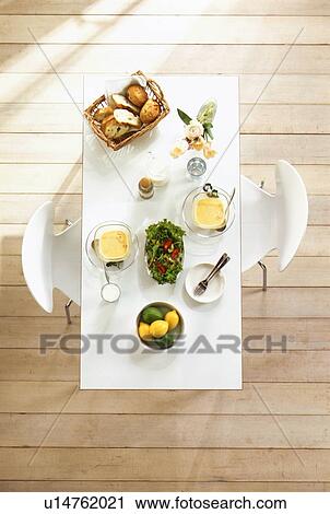 Stock Image - Food on white table. Fotosearch