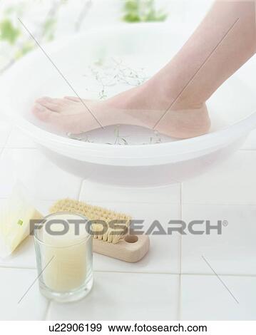 Stock Photo - Foot in a bowl of water. Fotosearch