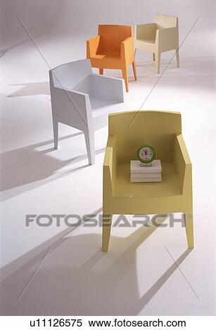 Four modern chairs in curve shape View Large Photo Image Stock Photography - Four modern chairs in curve shape. Fotosearch