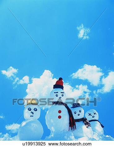 Four snowmen against the sky View Large Photo Image Stock Photography - Four snowmen against the sky. Fotosearch