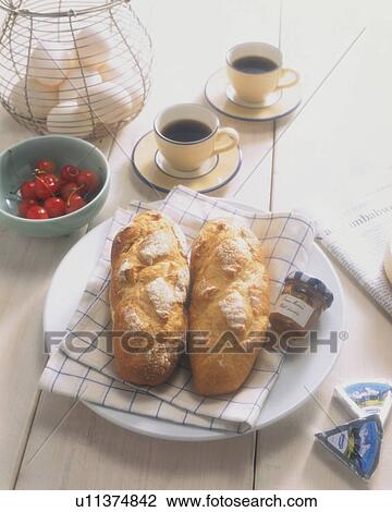 Fresh bread rolls and coffee for breakfast View Large Photo Image Stock Image - Fresh bread rolls and coffee for breakfast. Fotosearch