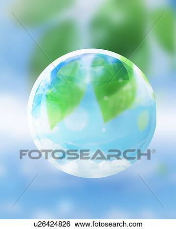 Stock Photograph - Fresh green leaves in the sunlight seen through a glass sphere. Fotosearch