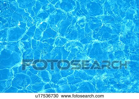 Stock Image - Full Frame View of Water in a Swimming Pool. Fotosearch