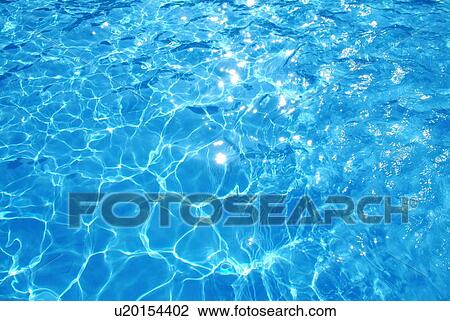 Stock Image - Full Frame View of Water in a Swimming Pool. Fotosearch