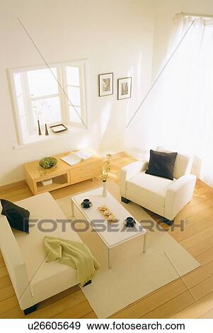 Furnished living room in light breeze View Large Photo Image Stock Photo - Furnished living room in light breeze. Fotosearch
