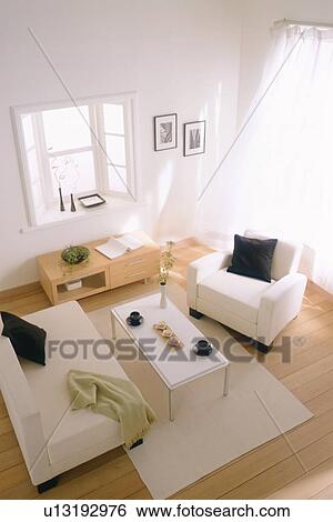 Stock Photograph - Furnished living room in light breeze. Fotosearch