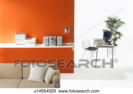 Furnished living room with orange wall View Large Photo Image Stock Photo - Furnished living room with orange wall. Fotosearch