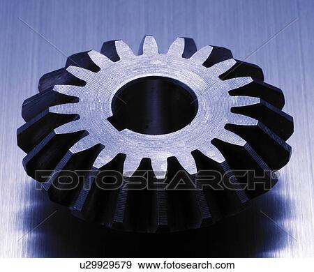 Stock Photo - Gear on metal surface. Fotosearch