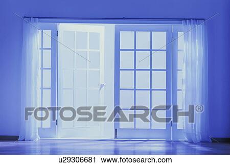 Glass doors in blue lit room View Large Photo Image Stock Image - Glass doors in blue lit room. Fotosearch