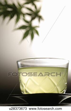 Glass of green tea View Large Photo Image Stock Image - Glass of green tea. Fotosearch