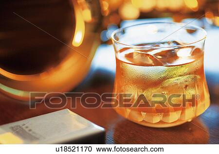 Stock Image - Glass of whiskey. Fotosearch