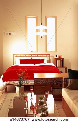 Glass table with glasses in bedroom View Large Photo Image Stock Photo - Glass table with glasses in bedroom. Fotosearch