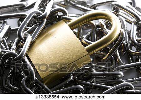Picture - Gold padlock and silver chain. Fotosearch