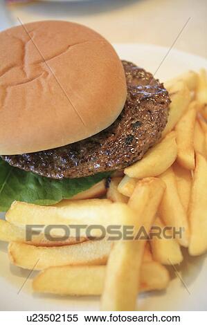 Hamburger and French fries View Large Photo Image Stock Photography - Hamburger and French fries. Fotosearch