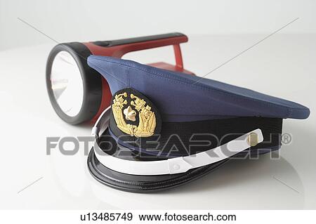 Stock Photo - Hat and flashlight. Fotosearch
