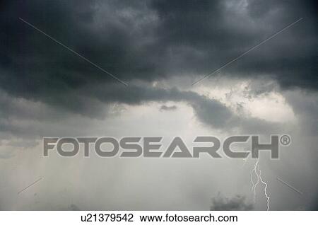 Heavy Thunderclouds and Lightning View Large Photo Image Stock Image - Heavy Thunderclouds and Lightning . Fotosearch