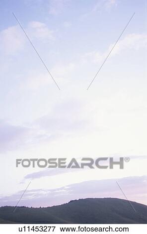 Stock Photo - Higashiyama plateau in early morning. Nagano Prefecture, Japan. Fotosearch