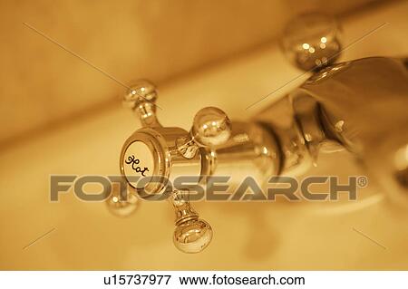 Stock Photo - Hot water faucet. Fotosearch