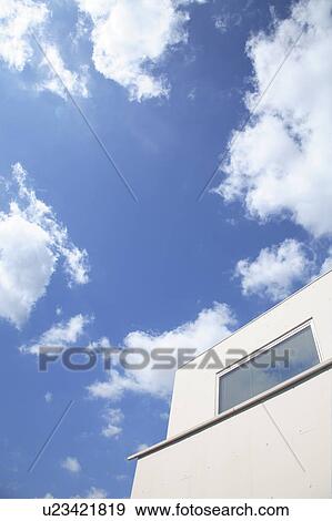 Stock Photo - House and sky, Ota ward, Tokyo Prefecture, Honshu, Japan. Fotosearch