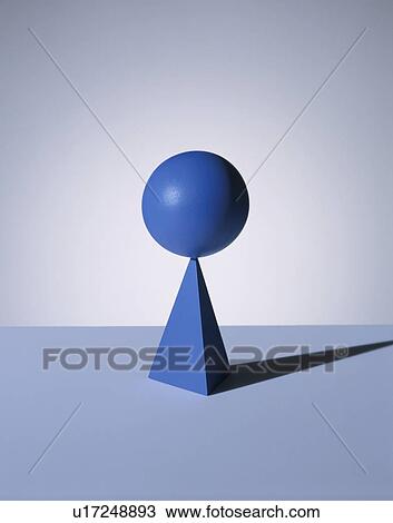 Stock Image - Illustration of ball and Three-sided Pyramid. Fotosearch
