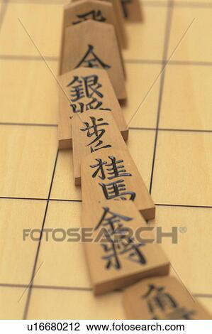 Japanese chess pieces on board, close up View Large Photo Image Stock Image - Japanese chess pieces on board, close up. Fotosearch