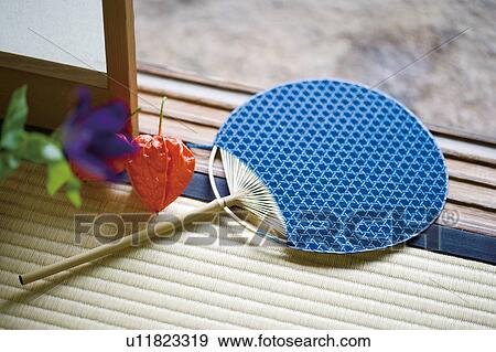 Japanese fan on Tatami mat View Large Photo Image Stock Photo - Japanese fan on Tatami mat. Fotosearch
