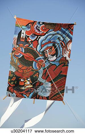 Stock Photo - Japanese kite flying in sky. Fotosearch