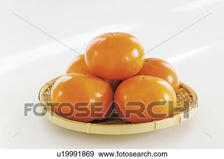 Japanese Persimmons View Large Photo Image Stock Photo - Japanese Persimmons. Fotosearch