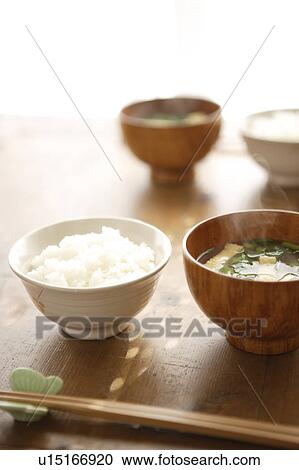 Stock Image - Japanese simple dishes, rice and miso soup. Fotosearch