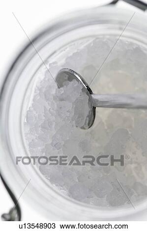 Stock Image - Jar and Spoon. Fotosearch