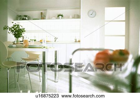 Stock Image - Kitchen and dining room. Fotosearch