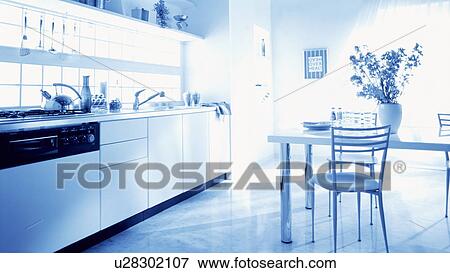 Stock Photo - Kitchen and dining table. Fotosearch
