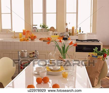Kitchen with orange theme View Large Photo Image Stock Photo - Kitchen with orange theme. Fotosearch