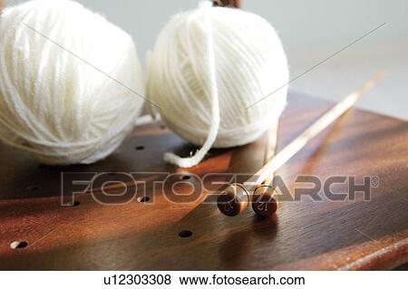 Knitting needles and balls of yarn View Large Photo Image Stock Photo - Knitting needles and balls of yarn. Fotosearch